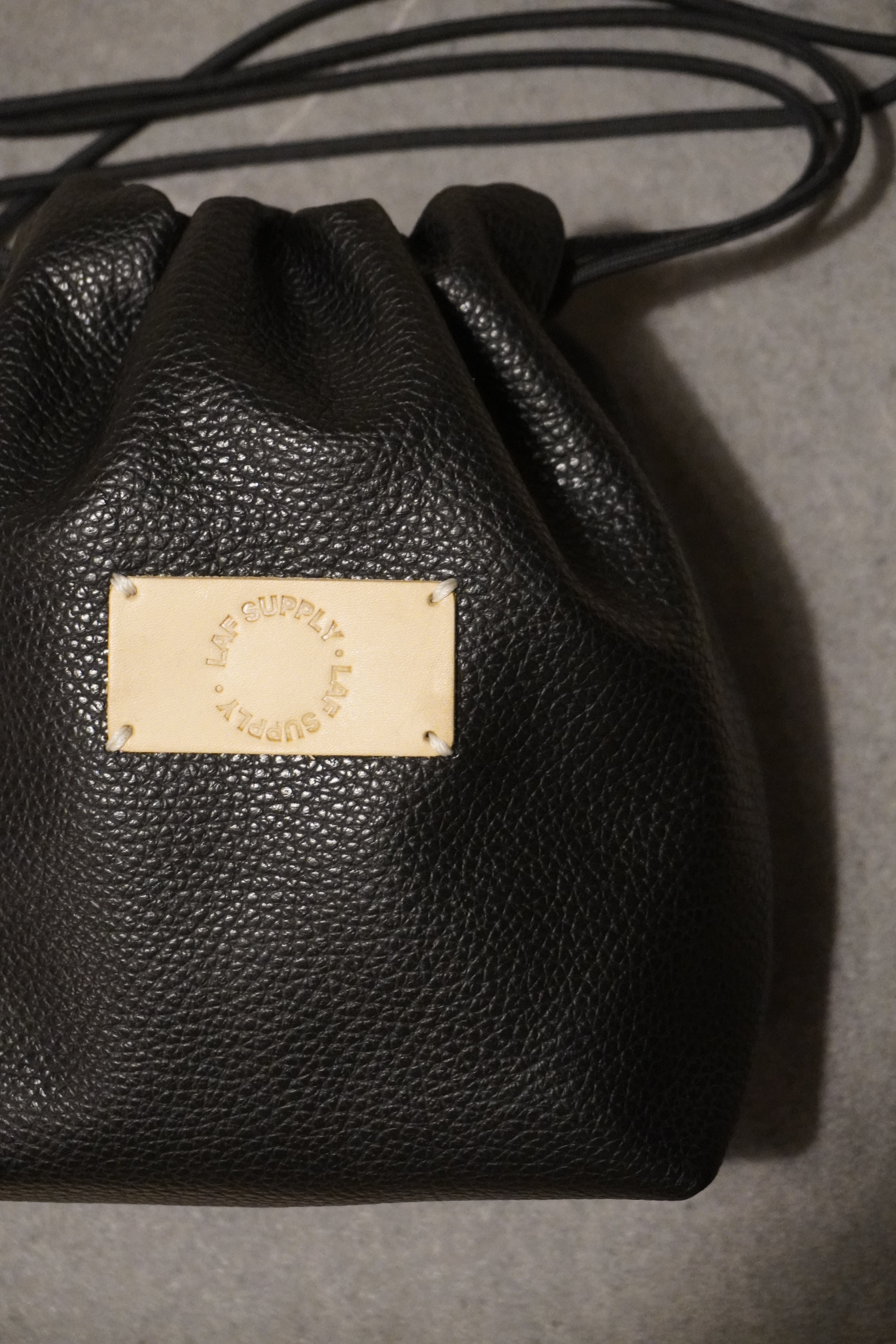 leather drawstring bag